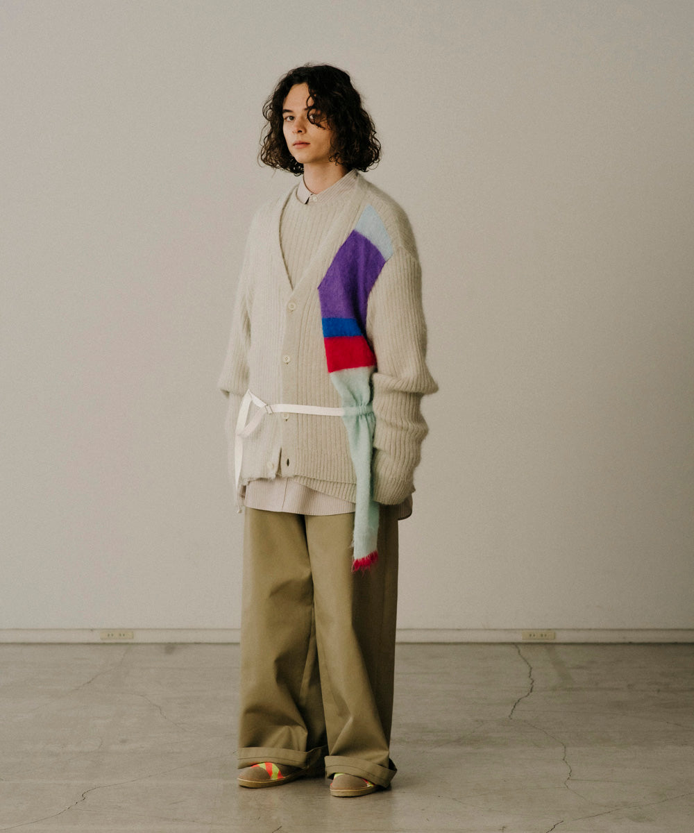 ASSYMETRICAL BELTED KNIT
