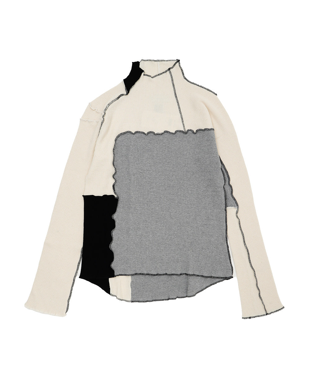 ASSYMETRICAL PATCHWORK HIGH NECK