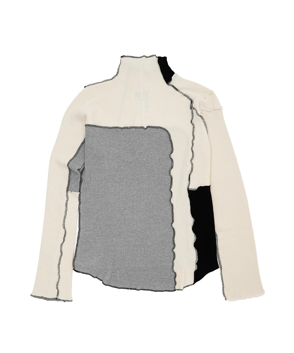 ASSYMETRICAL PATCHWORK HIGH NECK